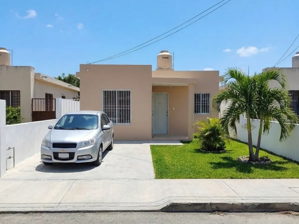 Casa amueblada de una planta con patio y jardín